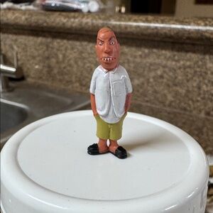 The product in the image is a "Homies" figurine. “Termite”